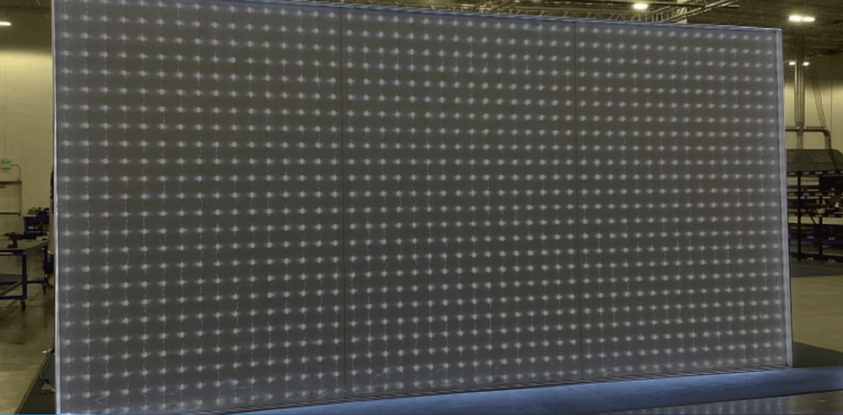 FIVE LightBlanket LED array illuminating — hundreds of evenly spaced emitters powering on across a full wall panel